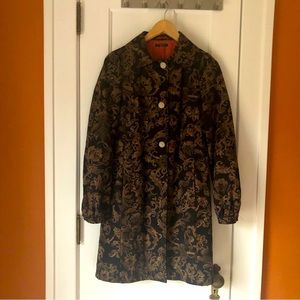 Cocktail coat in brown and black. 3/4 length with pearl buttons.